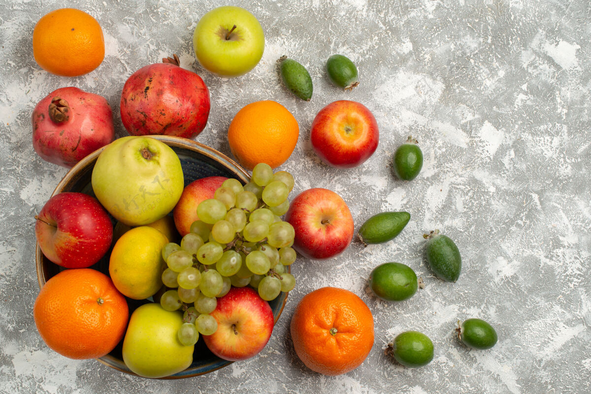 苹果顶视水果成分飞珠橘子和苹果 表面白皙成熟 水果维生素醇厚新鲜柑橘葡萄可食用的水果
