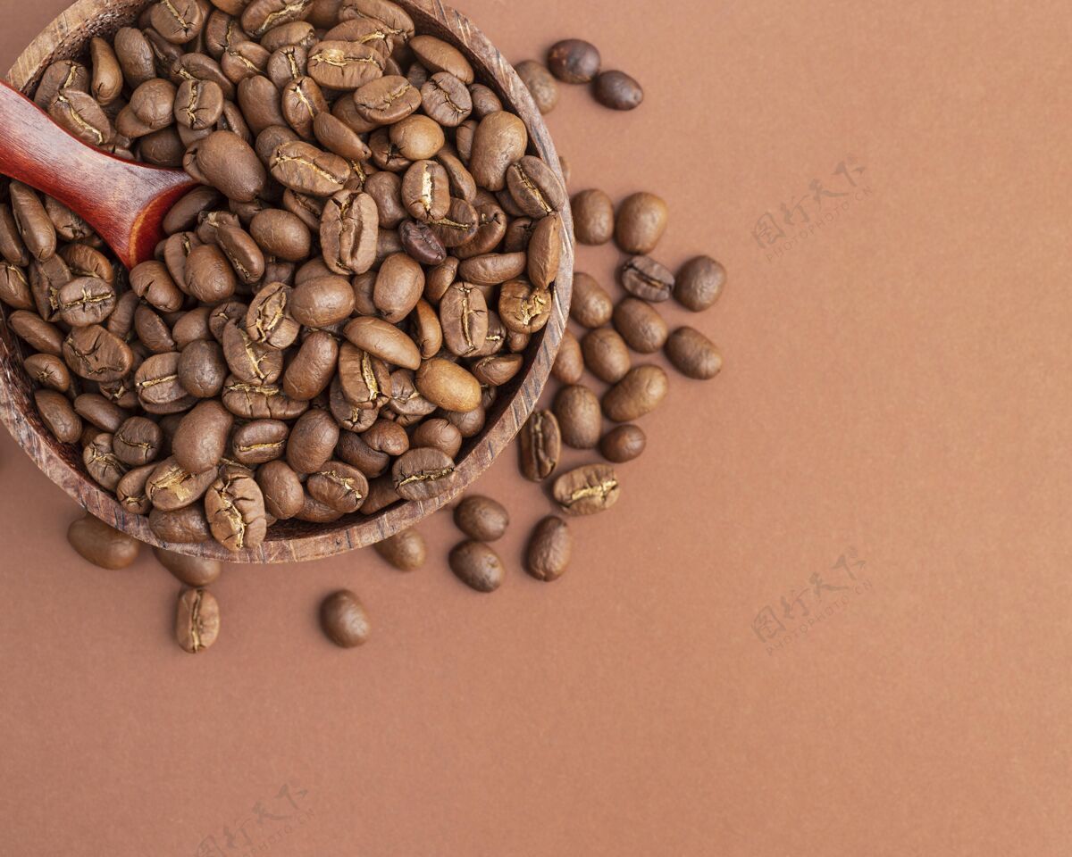 木勺咖啡豆顶视图碗木勺复制空间顶视图