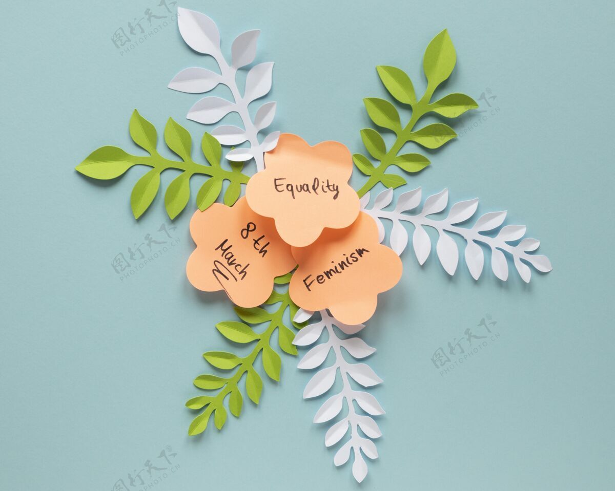 活动妇女节纸花和树叶的顶视图节日妇女节性别平等